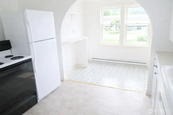 What a bright and airy kitchen with eating space! *Images from before current tenancy - home is a fixer*.