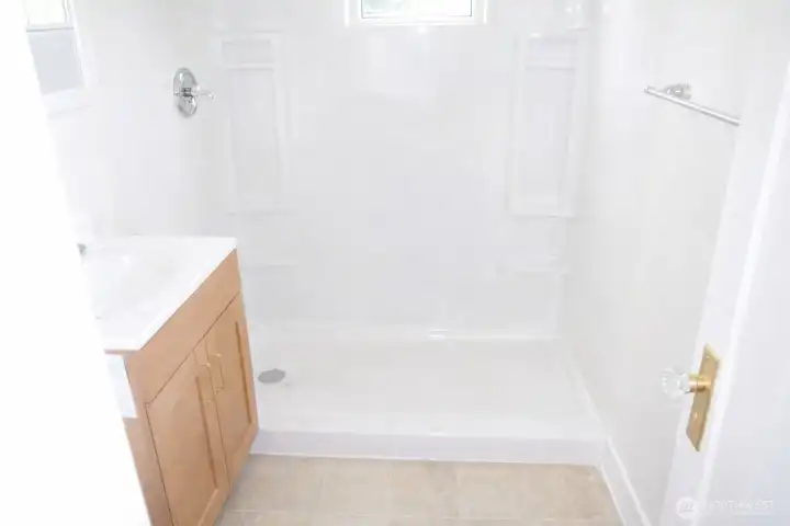 Bathroom with walk in shower! *Images from before current tenancy - home is a fixer*.