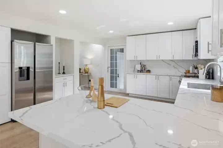 TONS of storage!  A Dedicated place for barware and full-length pantry cabinets keep entertaining easy and efficient.