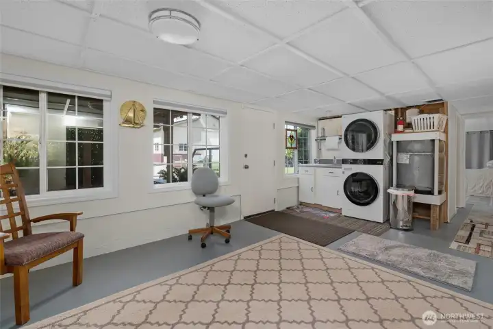 Bonus area off of lower level family room with laundry area. Door goes to back yard.