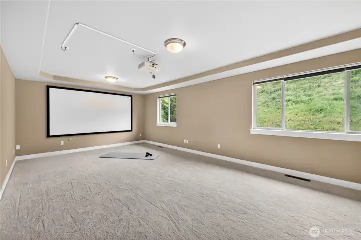 Just when you think this home has it all, you’ll discover the expansive bonus room—perfect as a media room or flex space—complete with equipment for the ultimate movie or game night experience.