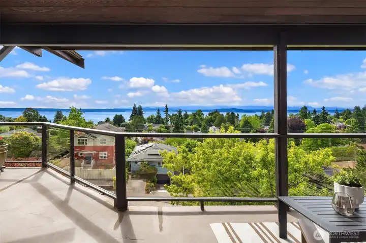 The main floor deck is full width with a second covered deck just below. Three doors lead out to the deck off the main floor. The main floor deck is full width with a second covered deck just below. Three doors lead out to the deck off the main floor.