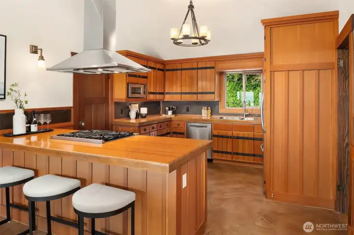 The kitchen island easily seats four-to-five. The kitchen island easily seats four-to-five.