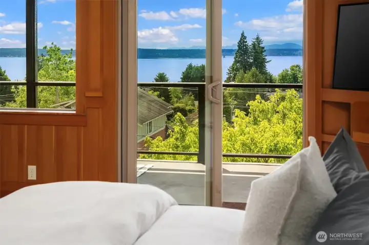 Wake up to Puget Sound and Olympic mountain views without even raising your head from your pillow. Wake up to Puget Sound and Olympic mountain views without even raising your head from your pillow.
