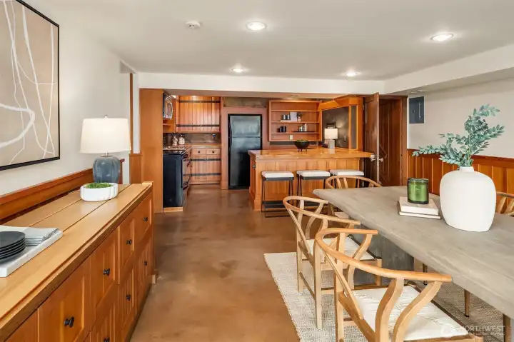 Looking across the expansive family room towards the second kitchen. Looking across the expansive family room towards the second kitchen.