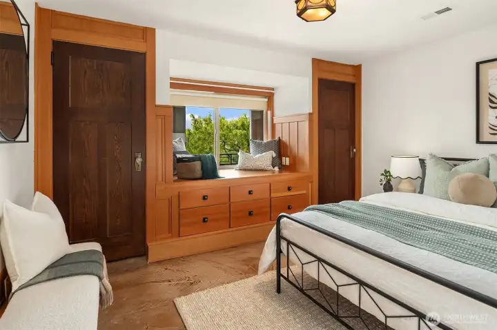The second bedroom located downstairs boasts twin closets and a built-in bank of drawers. The second bedroom located downstairs boasts twin closets and a built-in bank of drawers.