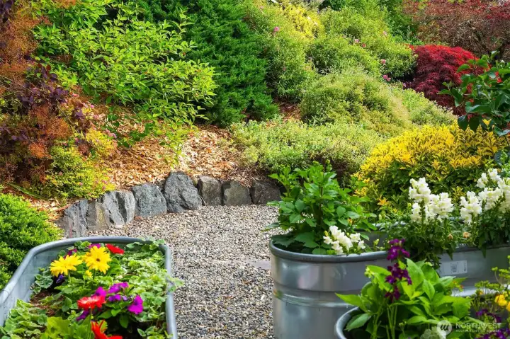 Surrounded by lush plantings, the landscape is simply stunning and private. Surrounded by lush plantings, the landscape is simply stunning and private.