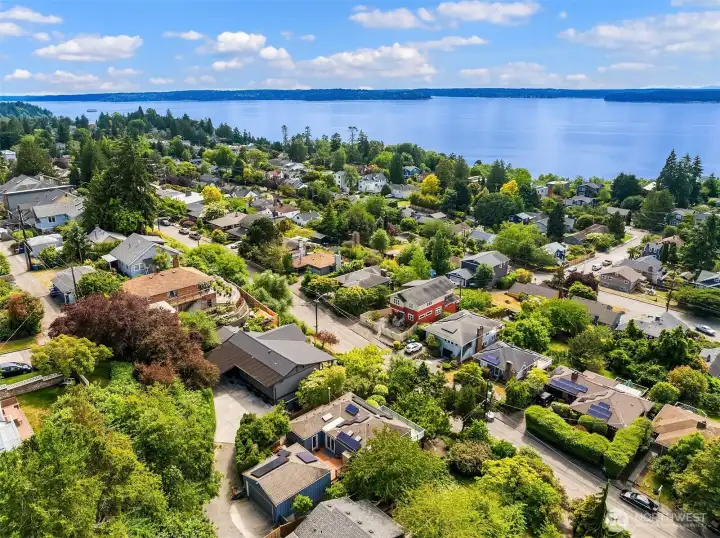The private easement in the back provides near level access to the main floor and covered parking. The private easement in the back provides near level access to the main floor and covered parking.