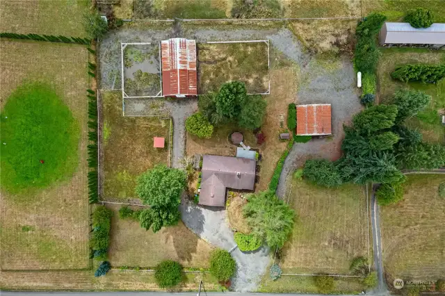 Aerial view of the rambler and barns.