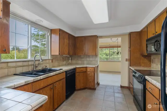 Another angle of the kitchen peering into the dining area.