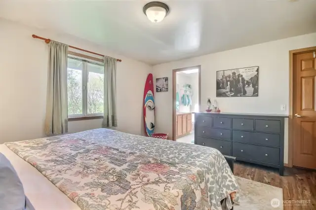 The primary bedroom also comfortably fits a large dresser as well