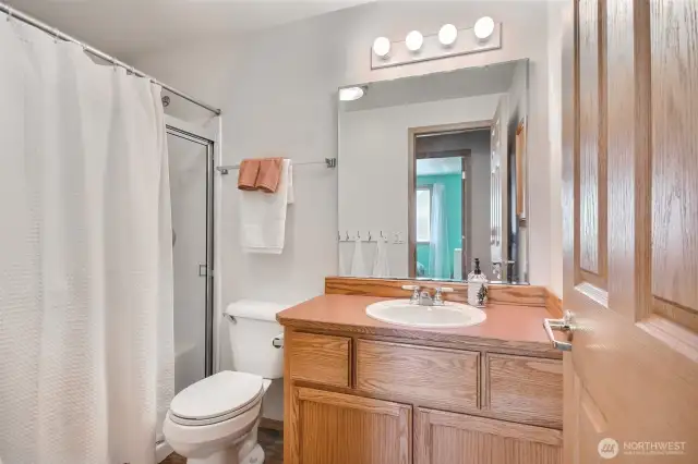 In the secondary bathroom you'll find a spacious walk-in shower for easy access.