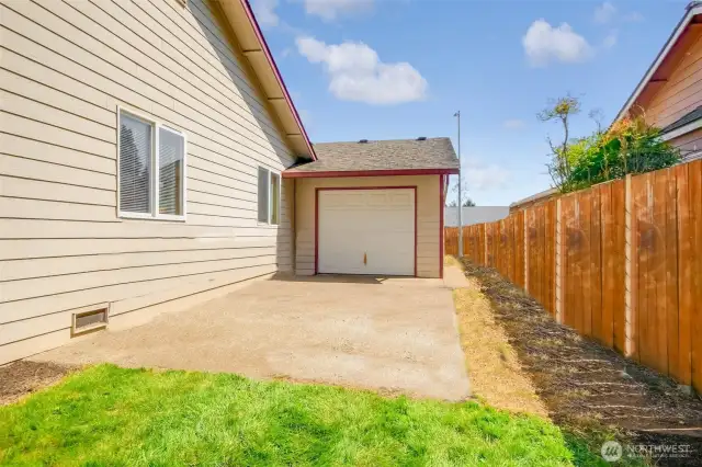 The pull-through 3rd bay gives an opportunity to park additional vehicles or toys on the side of the house