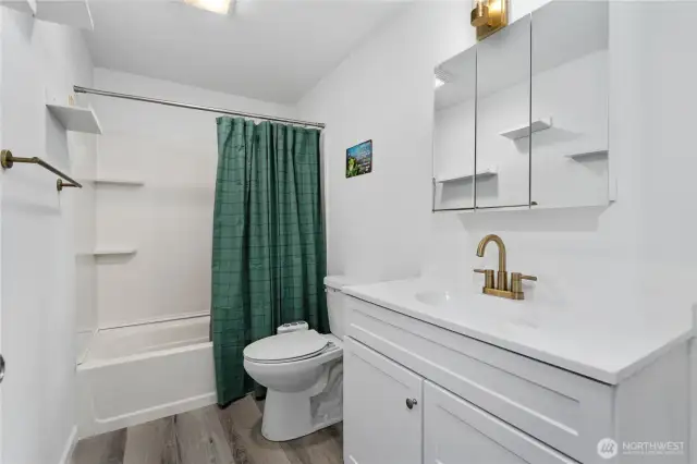 1 of 3 bathrooms