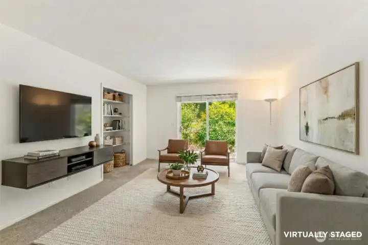 Downstairs Family Room with Access to Patio Virtually Staged