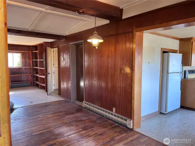 Entrance to Kitchen on right & Primary Bedroom/Bath