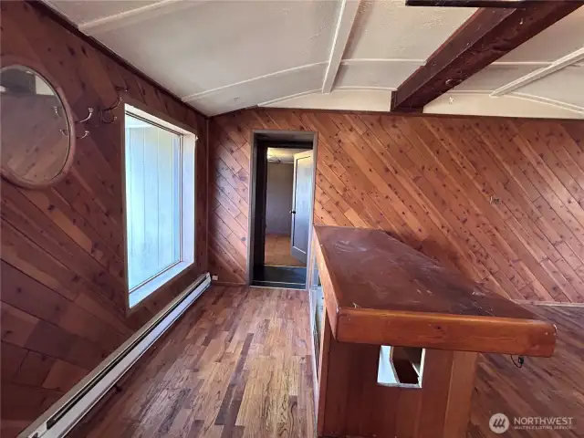 From front door to 2nd bedroom entrance-Display/ent. cabinet in foreground