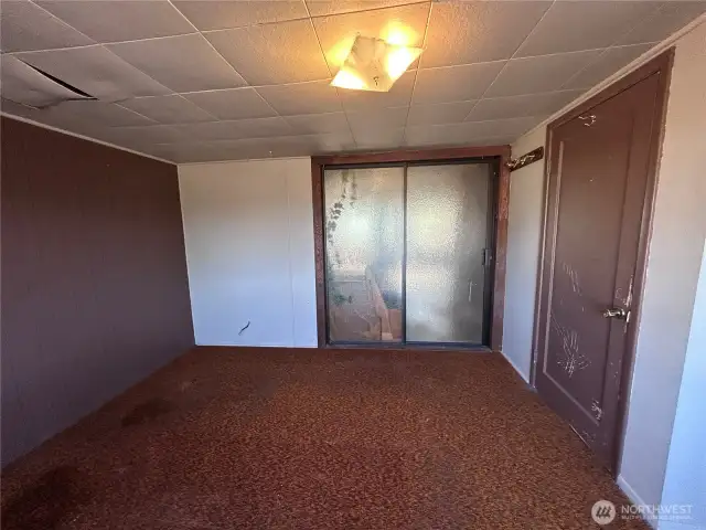 2nd Bedroom with a slider going out to the home-made hot tub