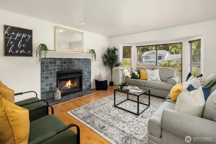 Light filled upstairs living space with real hardwood floors