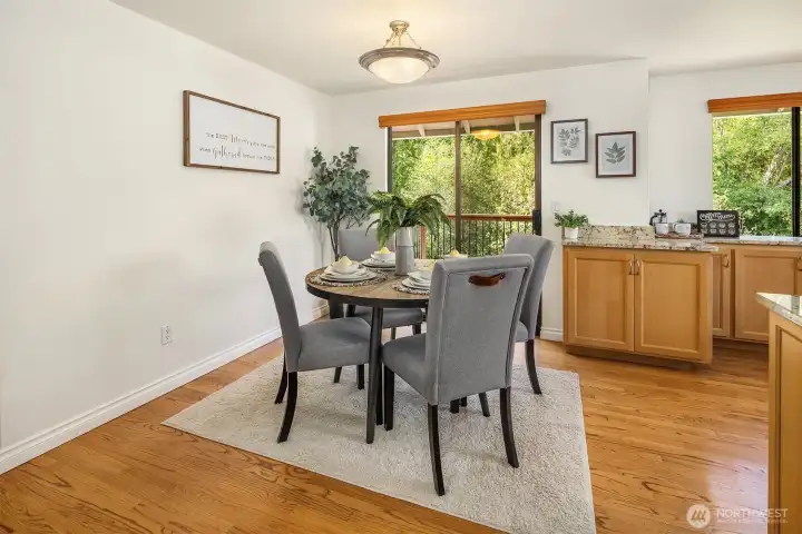 dining space leads to private upper deck and well appointed kitchen