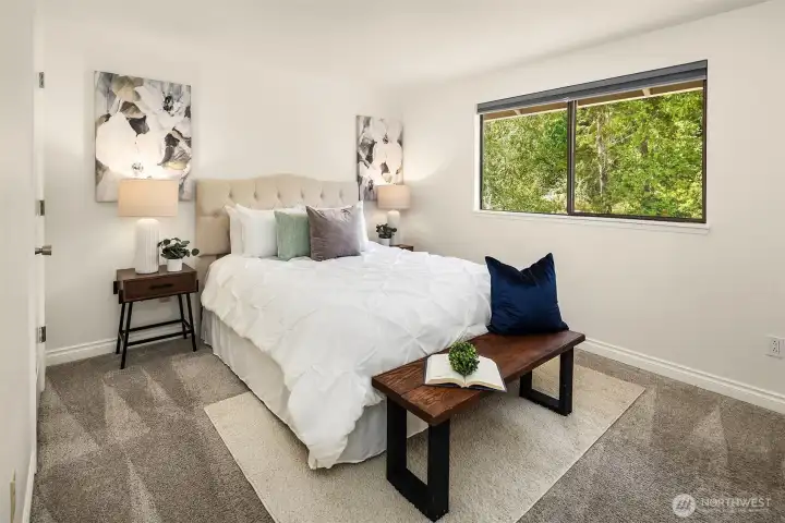 Primary bedroom with walk in closet and ensuite