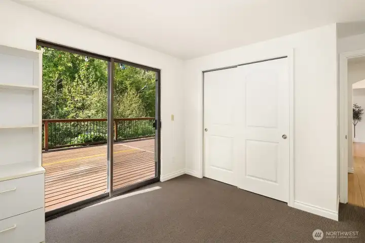 Second view from 4thbedroom/office which leads to large lower deck. This could easily be a MIL type unit on the lower level or income producing rental space