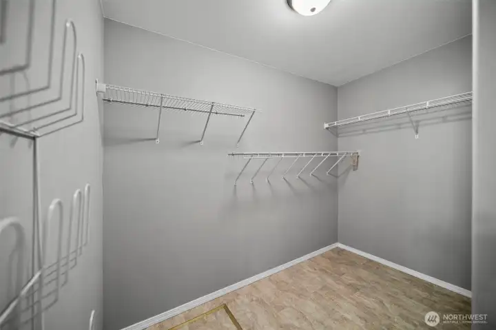 Walk-in closet in the primary bedroom.