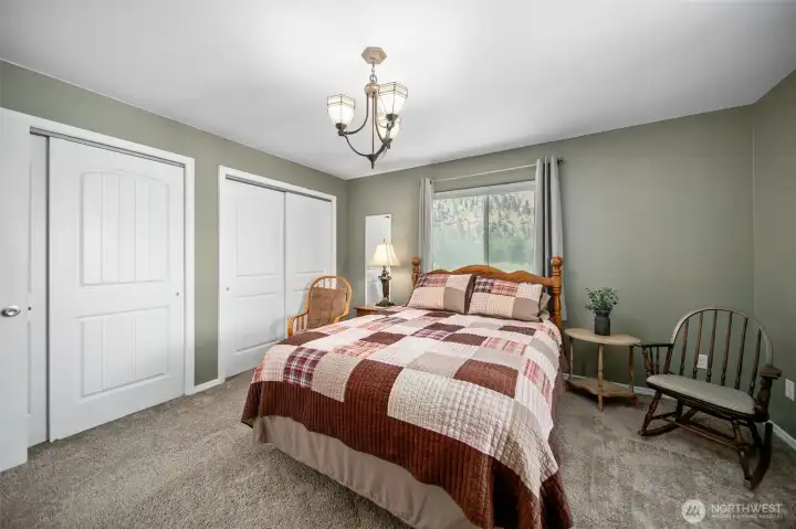 3rd bedroom with 2 large closets. Furniture has been moved out.