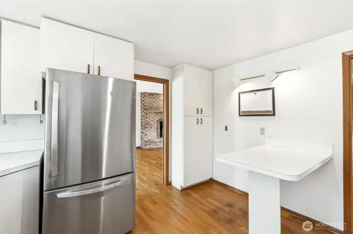 The kitchen has this eat-in space but this area could be repurposed easily