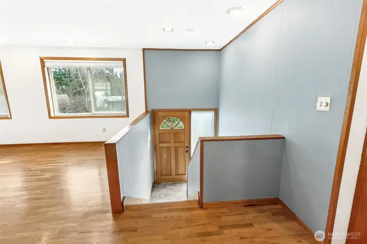 Split Entry. The house faces Southwest, so that door has seen some things. If it is tough to open, push hard at the bottom