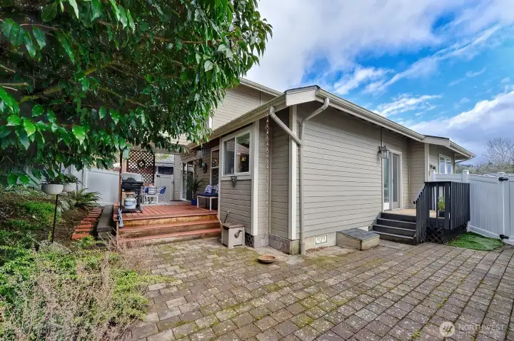Fully fenced back yard and patio area