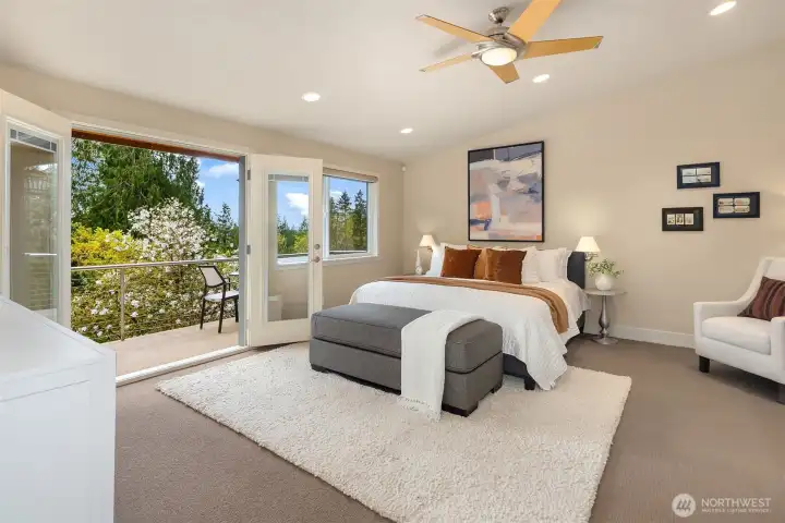 The primary suite goes well beyond expectations—with its own sitting area, double French doors opening to a private balcony overlooking the gardens, a generous walk-in closet… and a spa-like bathroom you’ll have to see to believe.