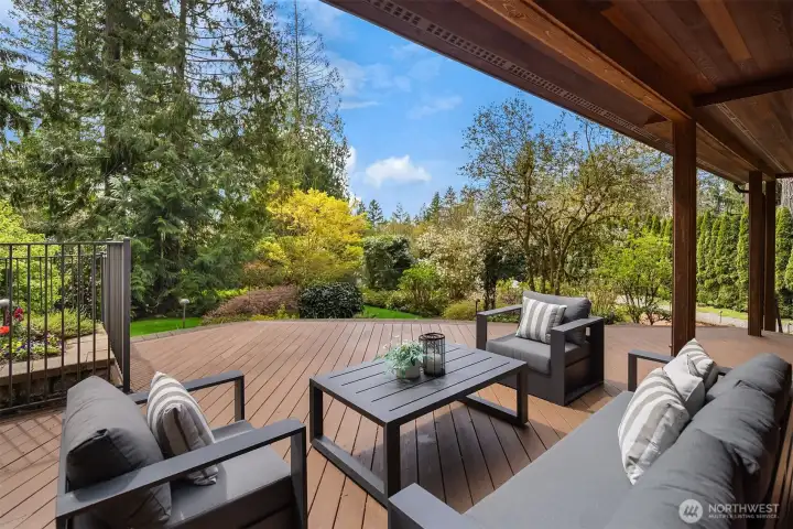 The covered outdoor deck is priceless in the Pacific Northwest—designed for year-round enjoyment, from quiet morning coffee to relaxed afternoons and long summer evenings.