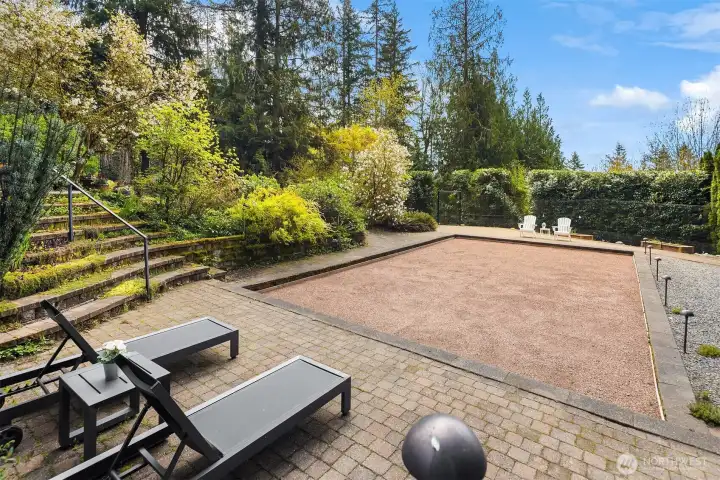 This home comes complete with a legitimate pétanque court—a refined nod to European leisure. Pétanque, the beloved French ball game similar to Bocce, is equal parts strategy and social ritual. Whether you're hosting friends or unwinding at the end of the day, it’s the perfect setting for a little friendly competition… best enjoyed with a chilled glass of rosé in hand.