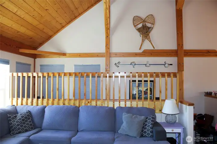 Vaulted ceilings create an open, airy feel.