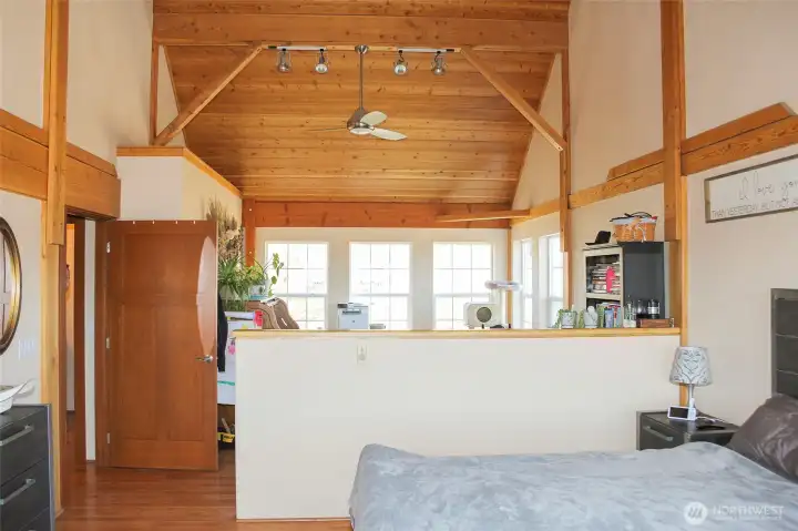 Private and serene primary bedroom with separate adjacent area for flexibility.