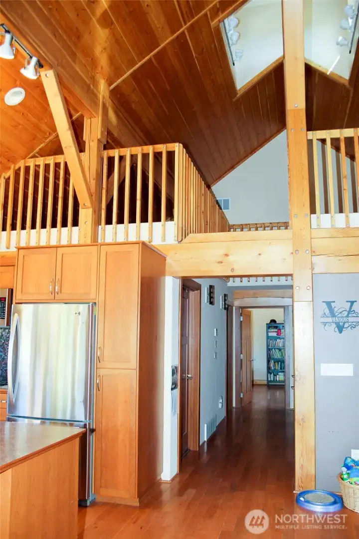 Soaring ceilings and lofted design create dramatic interior volume.