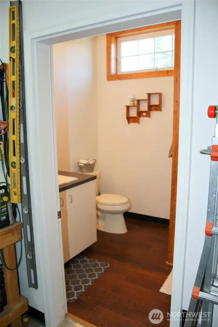 Bathroom with simple, clean design and natural light.