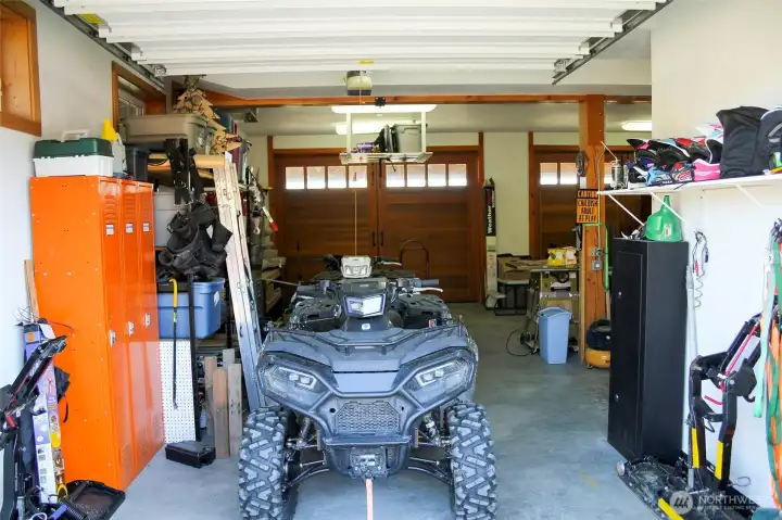 Garage and shop space with room for vehicles, tools, and equipment.