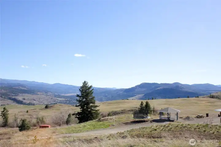 Wide-angle view capturing the scale, privacy, and natural beauty of the land.