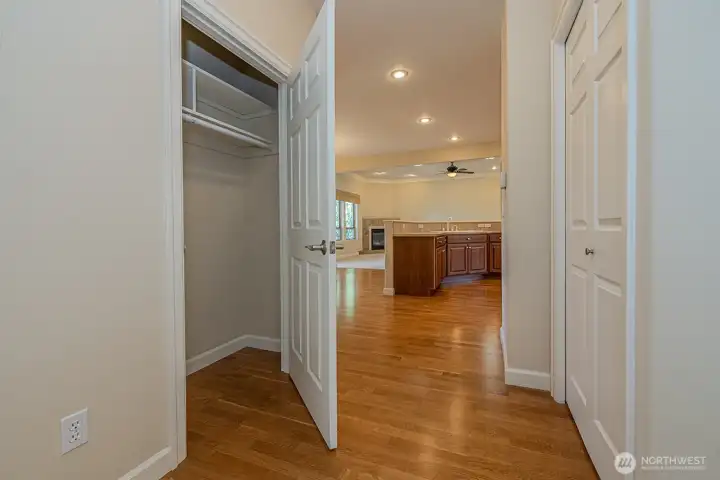 Closet adjacent to door from garage