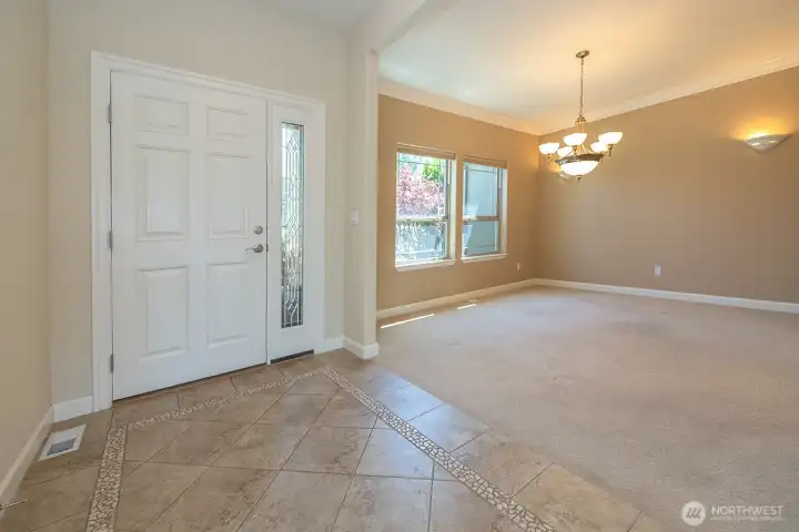 Entrance, tile landing, dining room