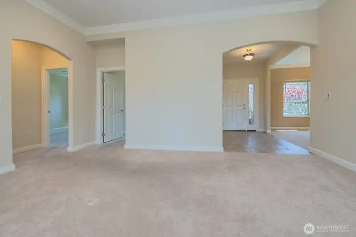 Living room from entrance and connects to the bedroom wing
