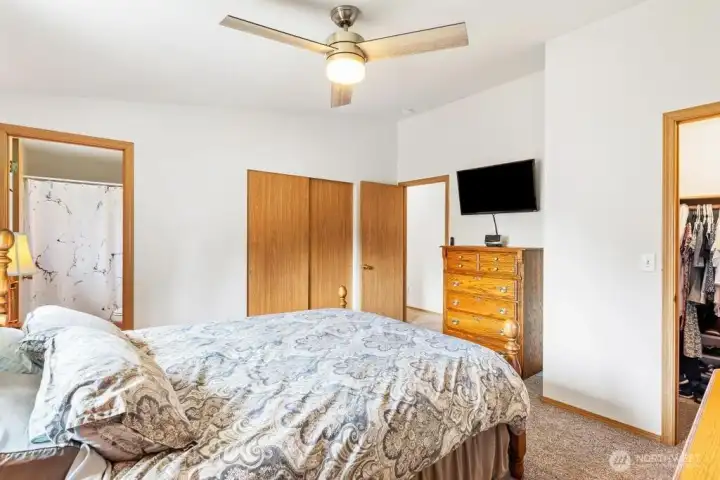 Primary suite with two closets and bathroom