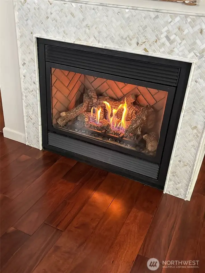 this cozy gas fireplace can economically heat the entire home... or use one of two mini-splits w/ heat and ac