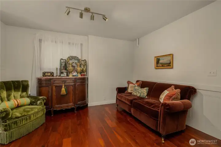 Alternate dining room space adjacent to the kitchen and livingroom... or could be the TV room right off of the kitchen.