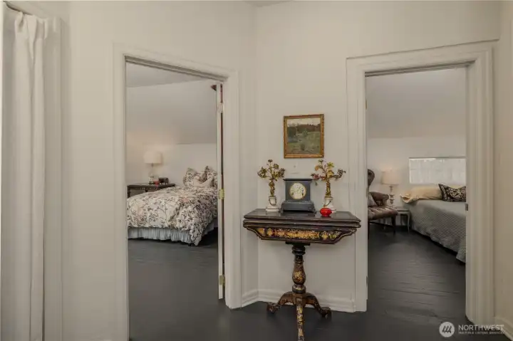 View from the top of the stairs landing into the bedrooms.