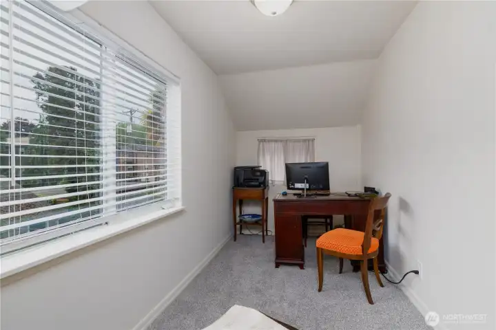 Carpeted bonus room off the back bedroom. So many potential uses!