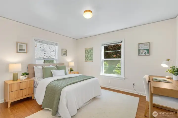 2 good-sized bedrooms upstairs.  And lower level rec room offers the possibilty to used as 3rd bedroom with en suite bathroom.