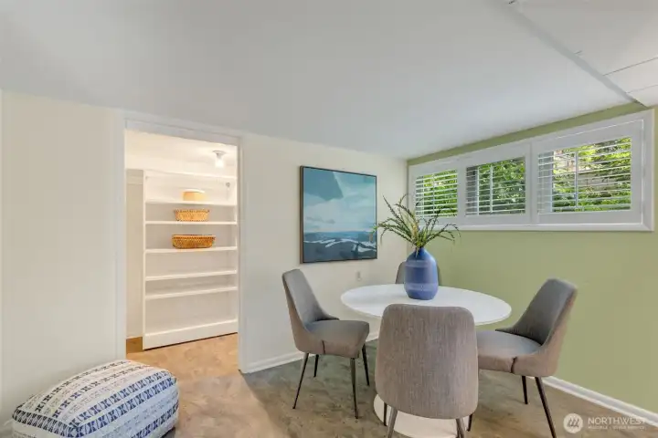 Half of the lower level is finished as a rec room looking on to lush garden.  So much potential - home theater, home office, playroom, guest bedroom with en suite bathroom.  And there is much opportunity on the unfinished side.